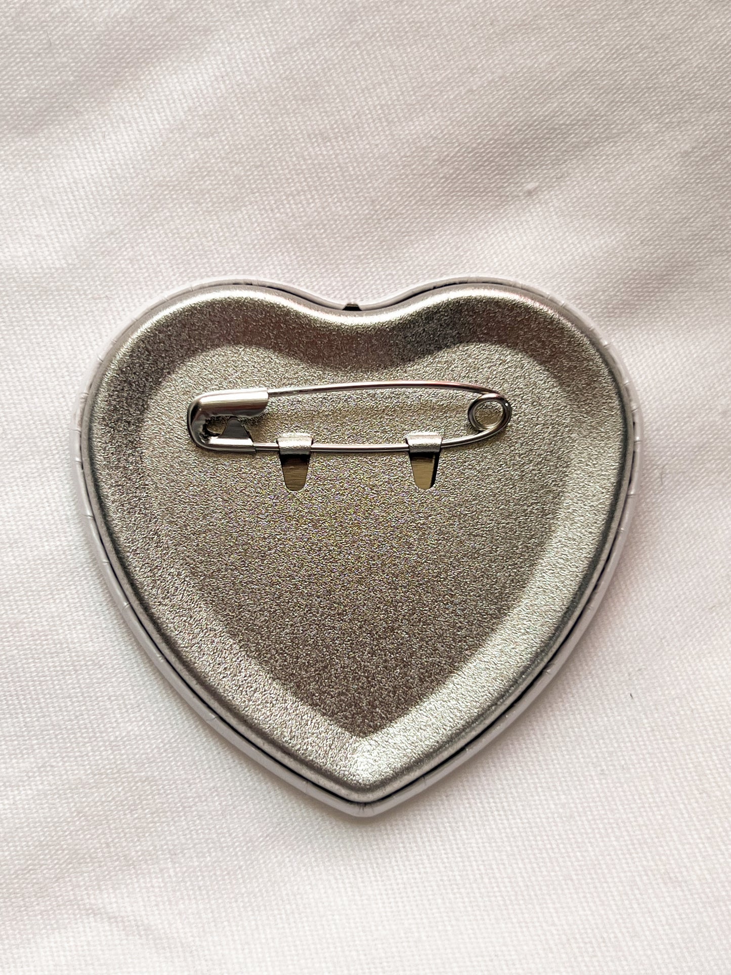i don’t fuck republicans heart-shaped holographic pin