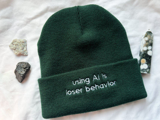 using AI is loser behavior beanie