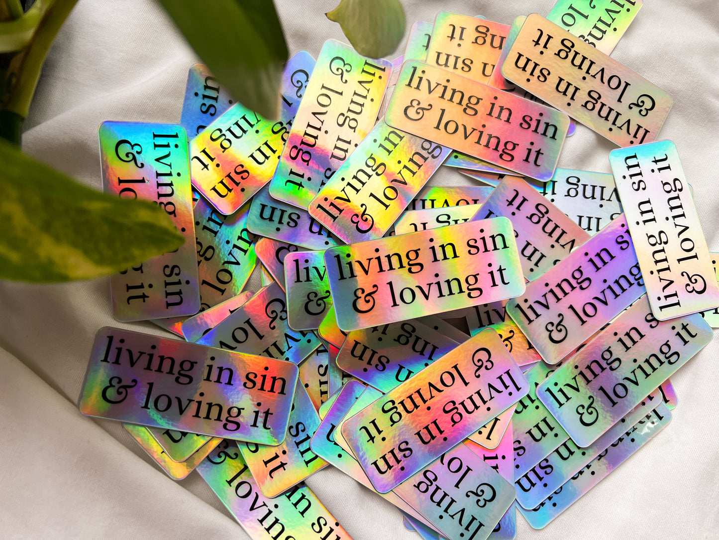 living in sin & loving it holographic sticker