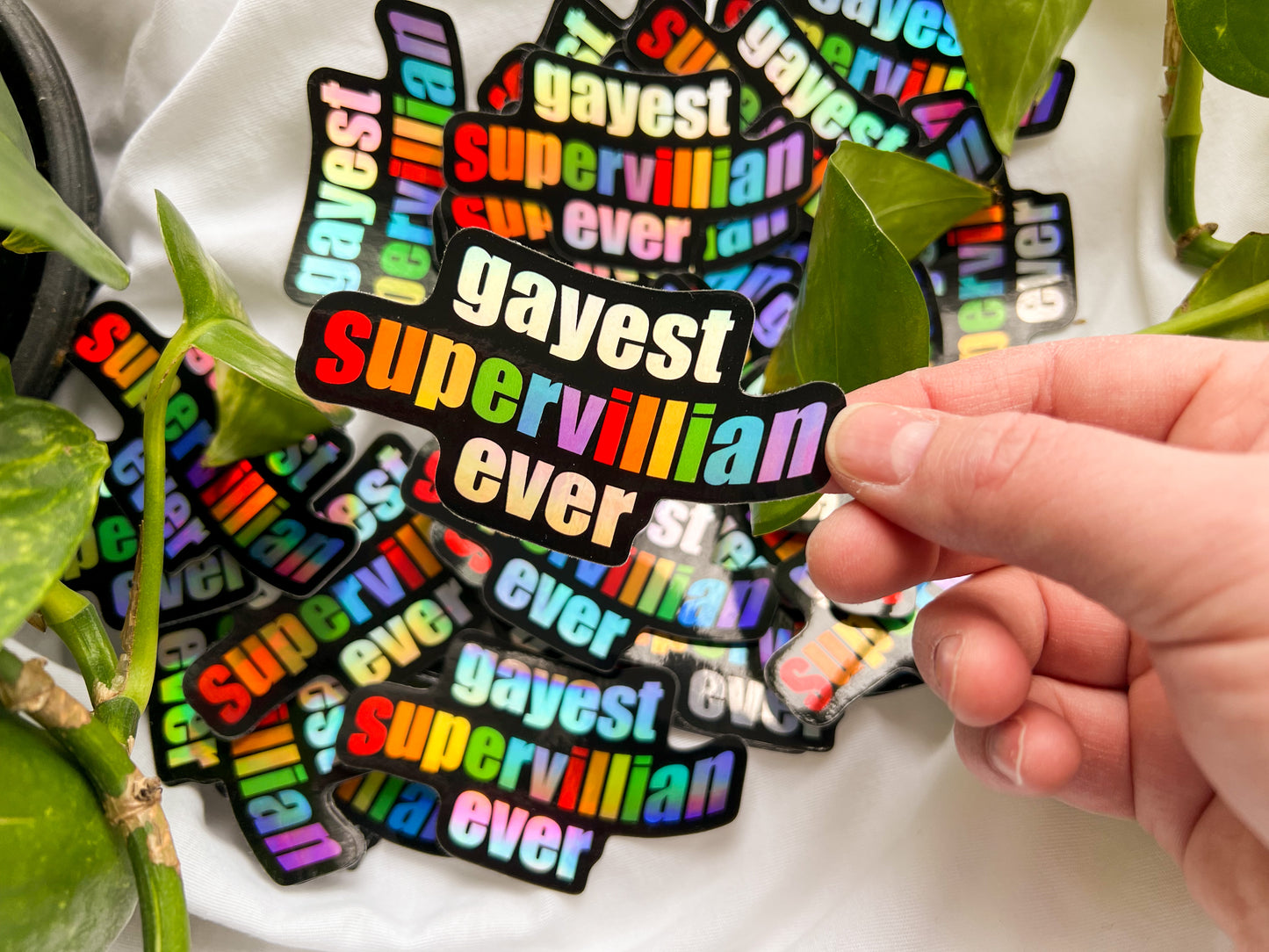 gayest supervillain ever holographic sticker (TYPO)